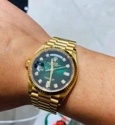 Rolex劳力士表把上的标志